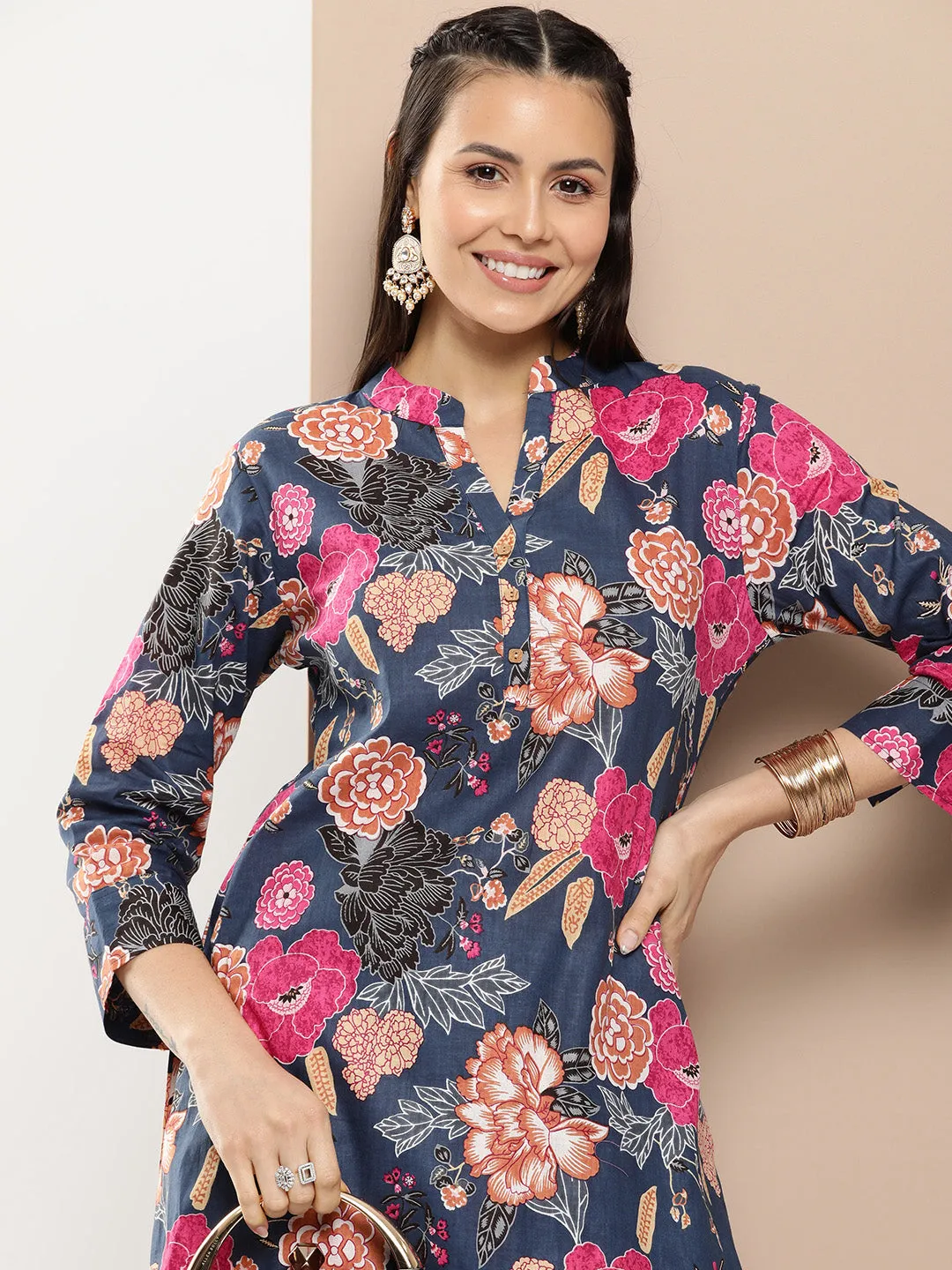 Blue Floral Print Kurta With Blue Floral Print Trousers.