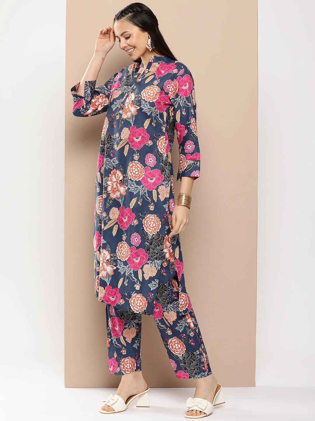 Blue Floral Print Kurta With Blue Floral Print Trousers.